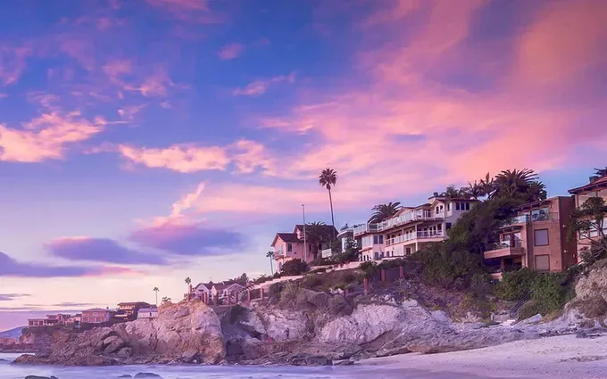 Sunset over the Laguna Beach coastline, one of the California luxury markets where jumbo financing is standard